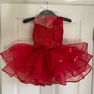 Brand new,  never worn, Revolution dance costume in Red as MC Medium child